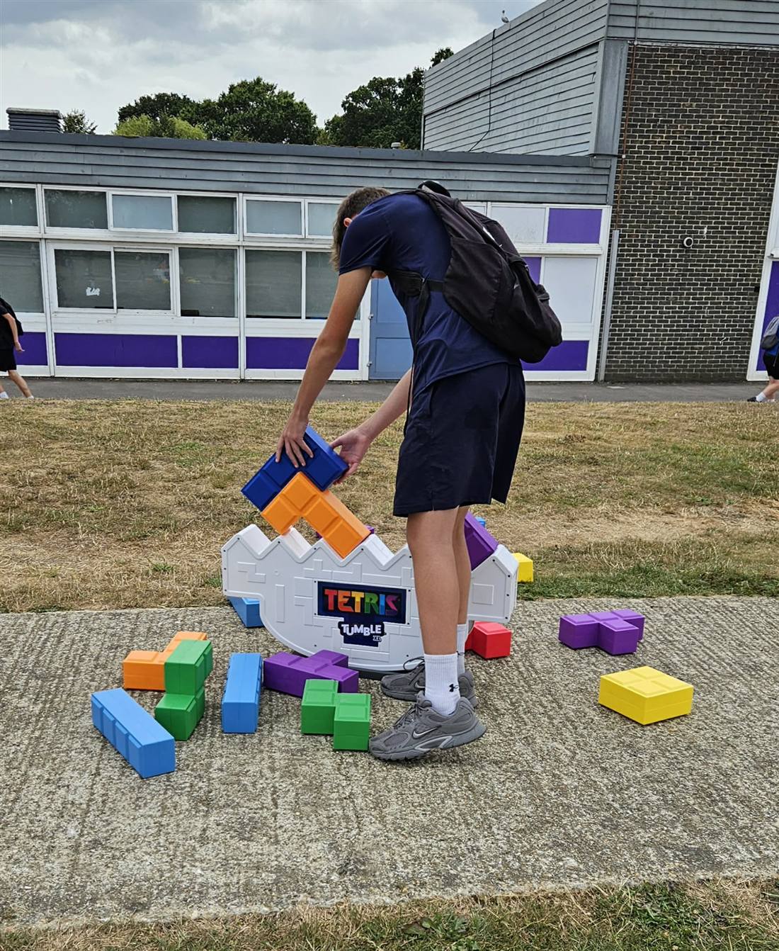 A student placing a piece on Tetris Tumble XL at Havant Academy