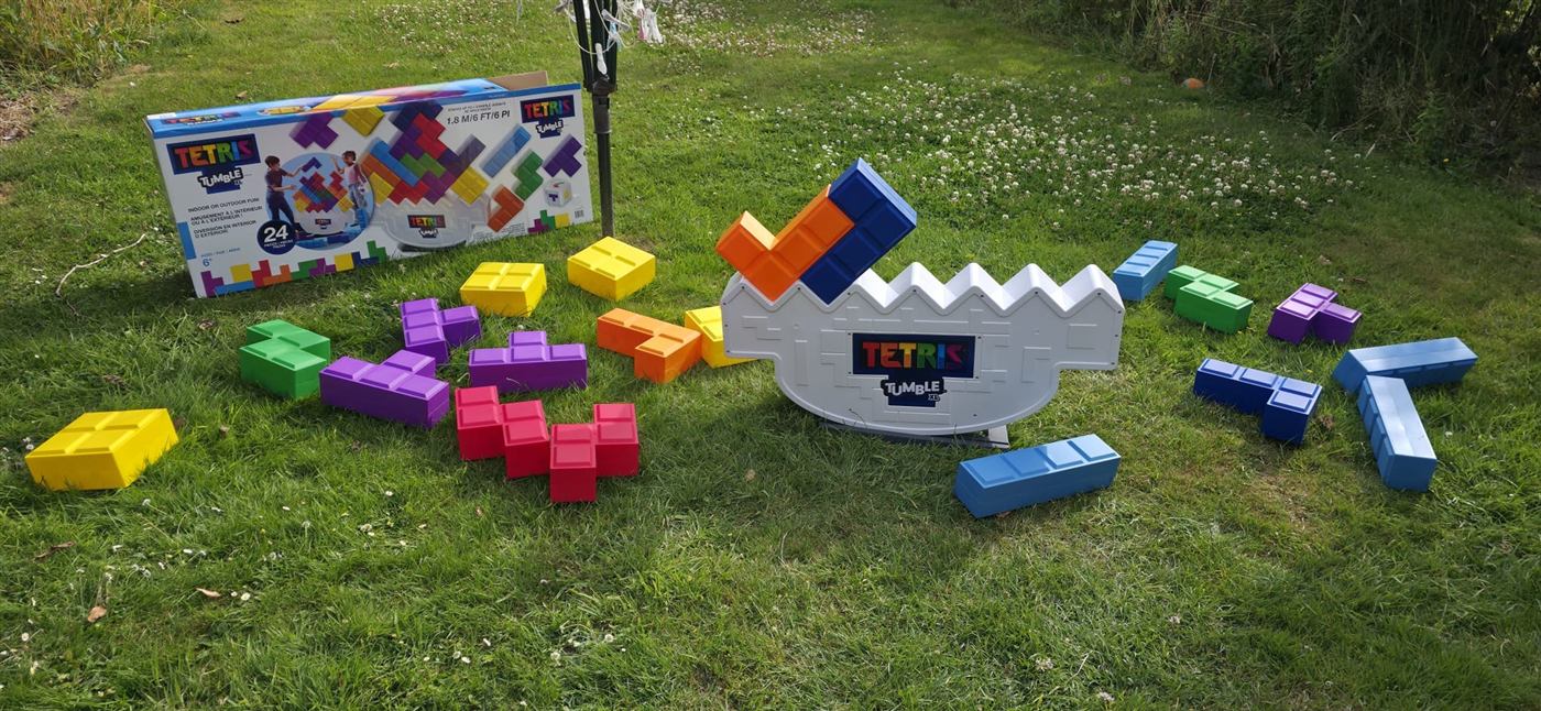 Giant Tetris Tumble balance game laid out on the grass